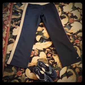 Ladies Nike mesh pants and Nike flip flops